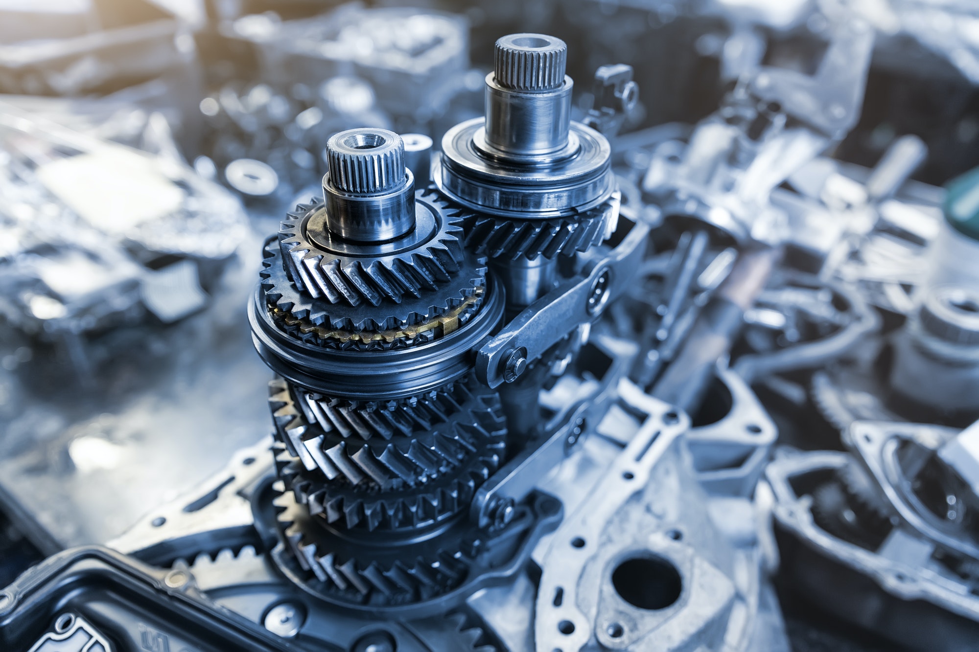 Closeup disassembled car automatic transmission gear part on workbench at garage or repair factory